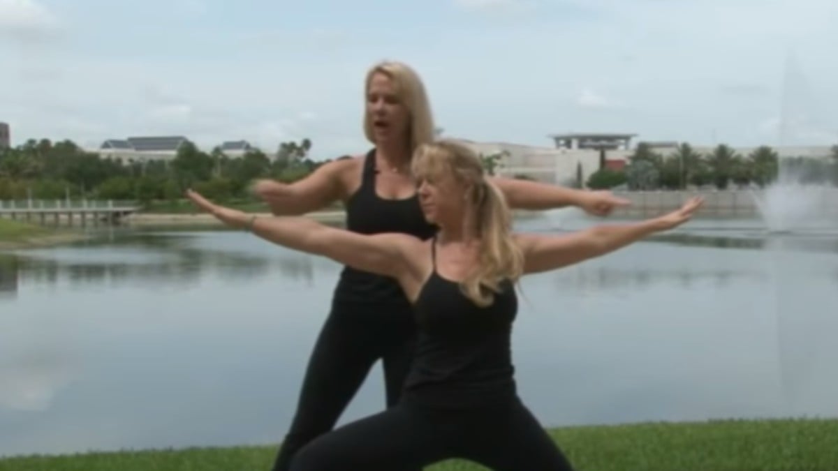 Alexandria and Anastasia Duval performing yoga