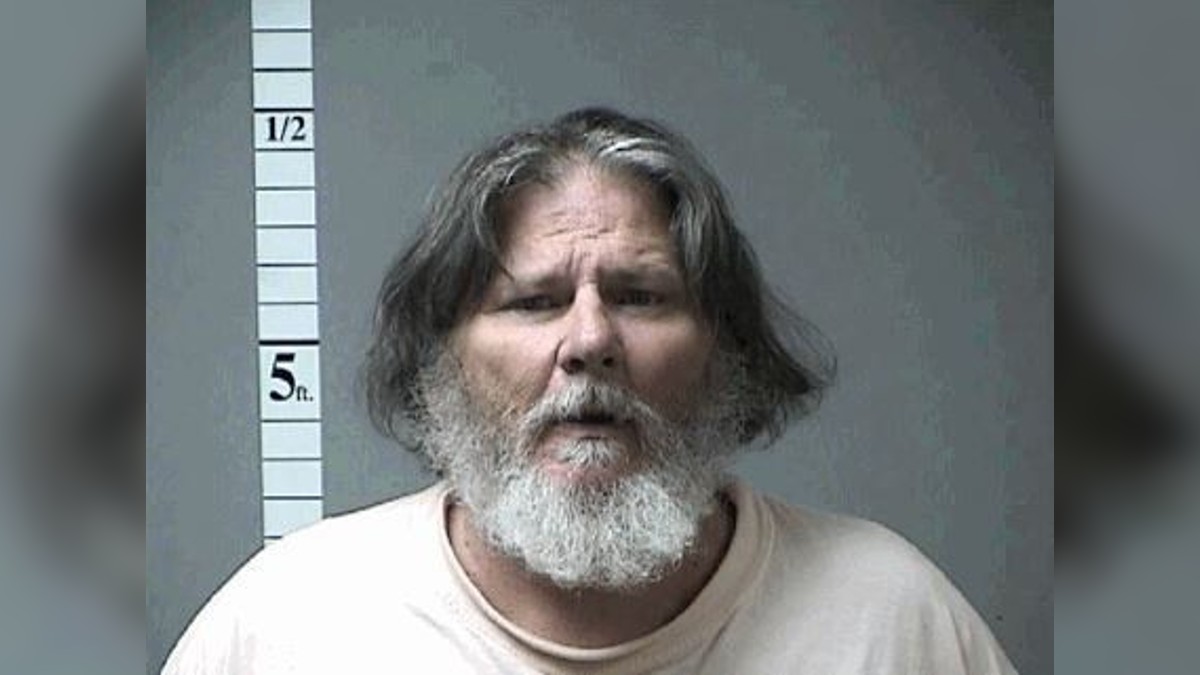 Mugshot of Earl Webster Cox