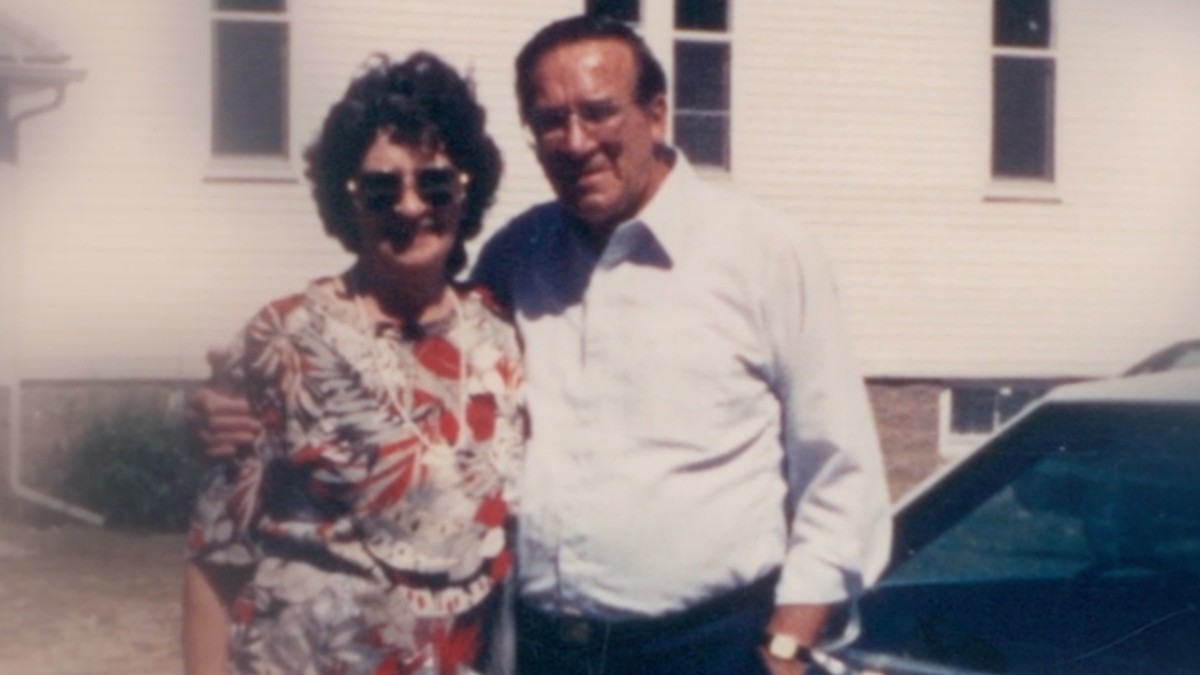 Grace and Charles Lewis pose for the camera