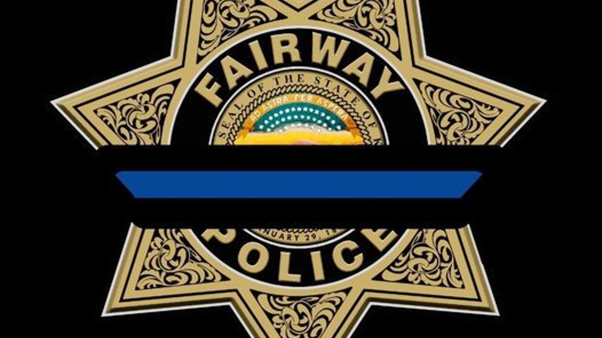 Fairway police badge with blue remembrance band