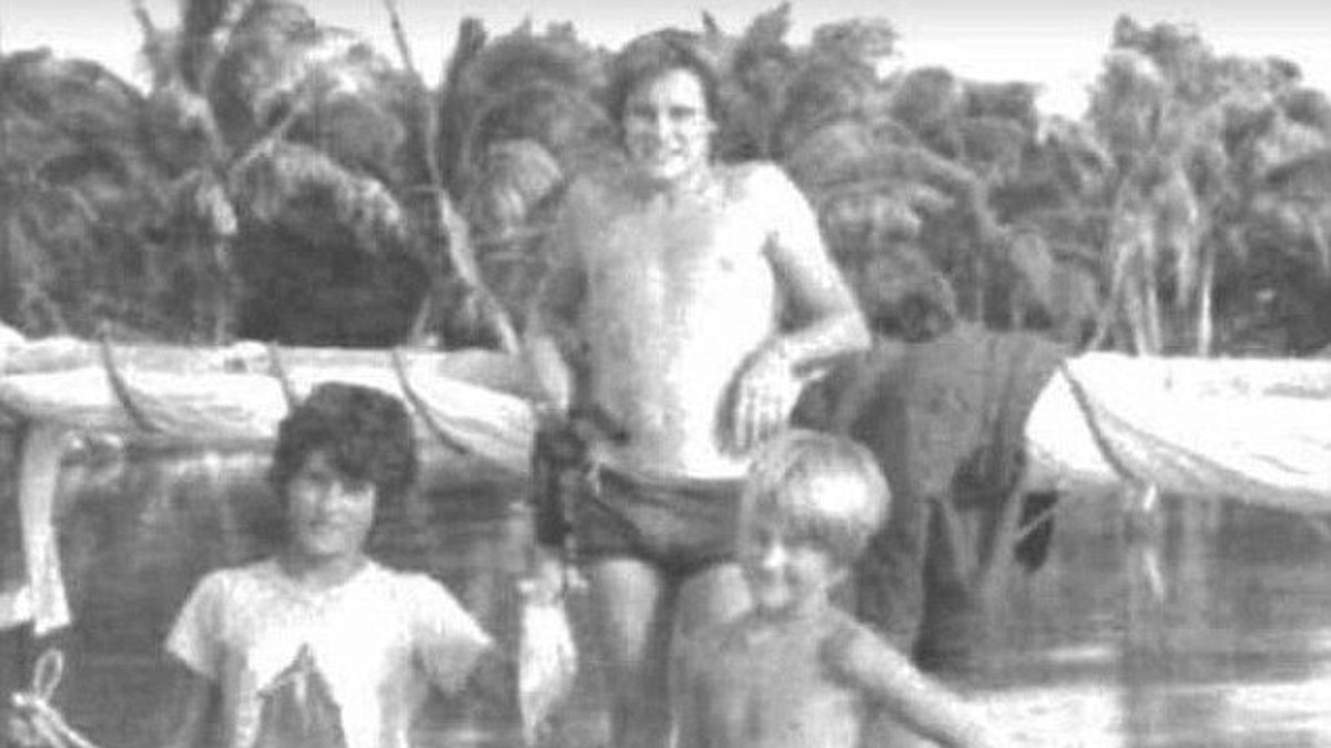 Christopher Farmer with Boston's two sons